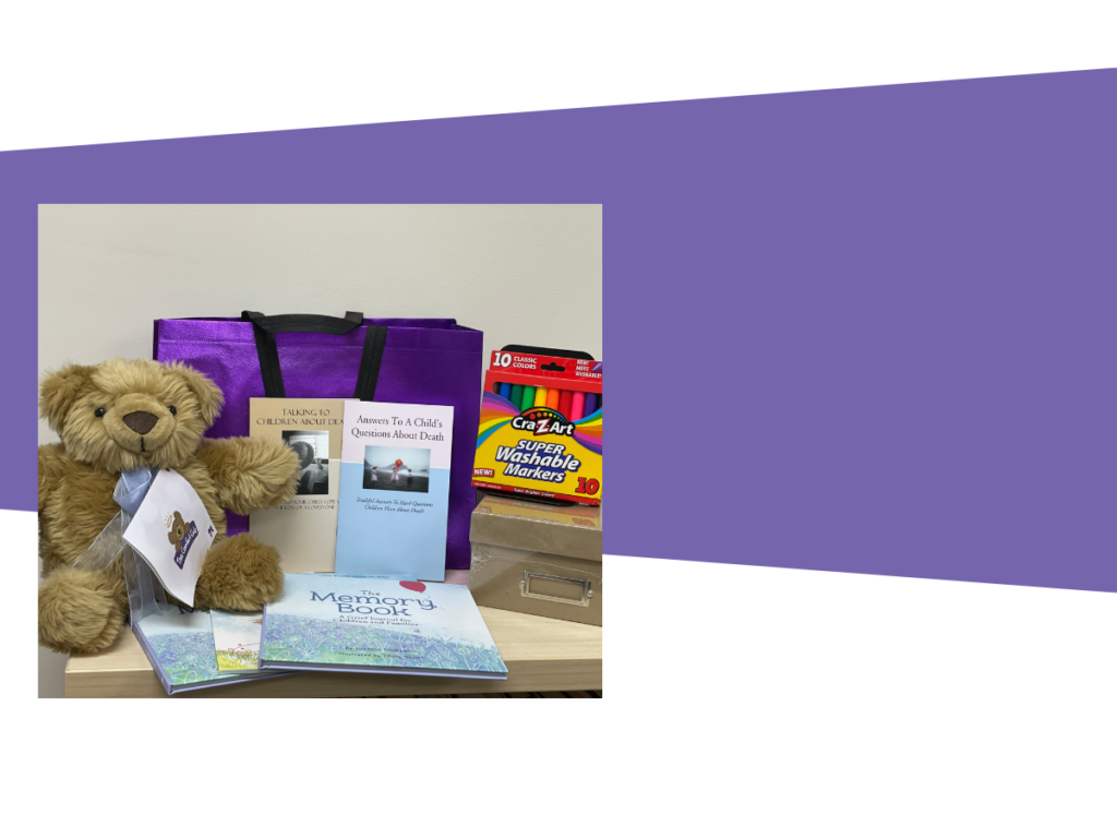 A teddy bear sits beside a stack of books and a purple bag, creating a cozy and inviting reading atmosphere.
